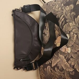 New, black Chico's half moon crossbody bag